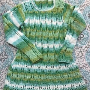 Its a size medium hand knitted sweater ..